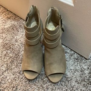 Tan heels. Never worn